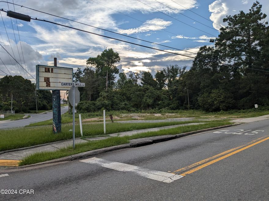 Intersection of Carters Mill Rd and Kelson Ave where the new round a bout will be built to enter the new road to the hospital.