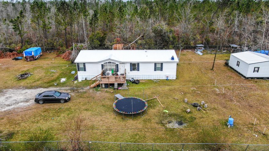 'CURRENTLY UNDER CONTRACT, SELLER ACCEPTING BACKUP OFFERS'  Very nice, very large manufactured home on over 1/2 acre. Close to Hwy 231. Formal living room, family room with fireplace. 3 bedrooms, 2 baths. recently remodeled. Minor hurricane damage was quickly repaired. Move in ready!  (All sizes approximate and taken from public records, buyer to verify any details buyer deems important),