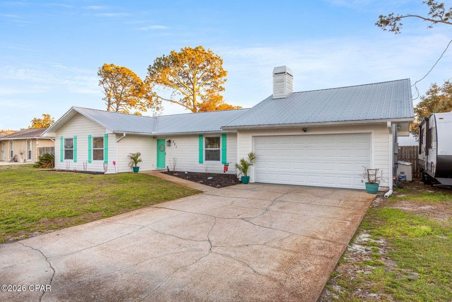 Charming home in the desirable North Lagoon area, ideally situated on a large lot in a private cul-de-sac. This well-maintained property offers a durable metal roof, paid-off solar panels, and a above-ground pool with expansive custom wood decking -- creating the perfect backyard for entertaining.

Inside, you'll find an updated interior with an open, comfortable layout and abundant natural light. The home features a spacious laundry room, generous living areas, and easy access to the outdoor patio and pool deck for seamless indoor-outdoor living.

The fully fenced yard provides privacy, green space, and a storage shed, while the extended driveway and garage offer ample parking and storage. Additional highlights include a built-in security system and sprinkler system.

Located just minutes from the lagoon, beaches, dining, and shopping, this move-in ready home combines smart upgrades, privacy, and Florida lifestyle living.