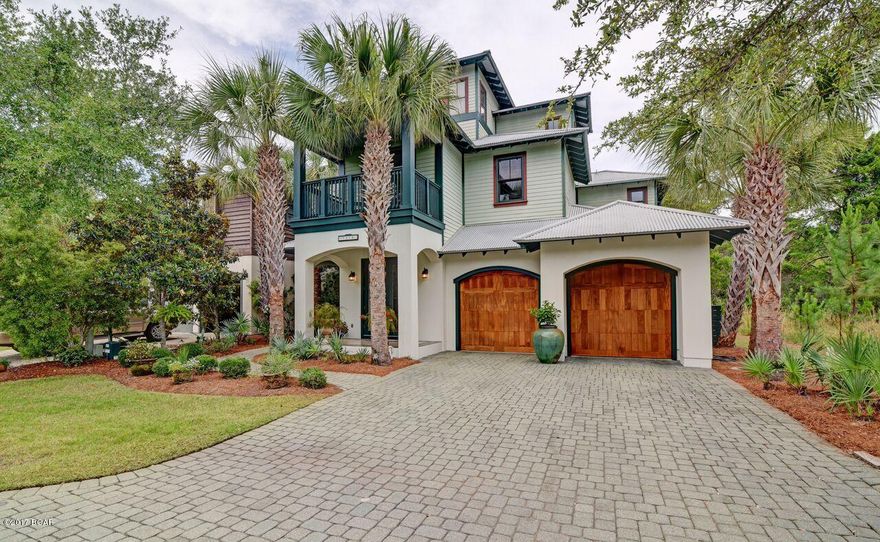 NO FLOOD INSURANCE REQUIRED! (See LOMA document attached to listing.) This gorgeous home with a 2 car garage (built by Rita Jones) has so many extras but also has a full bath and bedroom on the first floor. When you see the size and design of the porch, you will want to stay outside and entertain guests. When night falls, there are 3 more bedrooms and 2 more full baths on the 2nd floor.The Crow's Nest on the 3rd floor is the perfect place for bunk beds or for a hide-a-way for adults. Martinique is a much desired gated community in a wonderful school district. The beach and boating opportunities are less than a mile away. The fabulous new Grand Marlin Restaurant is just outside the gate & other popular restaurants are close by.