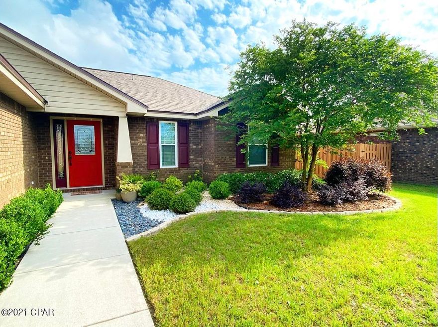 CURRENTLY UNDER CONTRACT, SELLER ACCEPTING BACKUP OFFERS Welcome home to this well-built home close to town and Tyndall AFB, this home feature custom wood cabinets, granite counter tops, stainless steel appliances, a screened in back porch with an open patio. This home also features Luxury Vinyl plank flooring throughout with modern trim and tasteful finishing's, an outside shower with both hot and cold water, irrigation (6 zones) for the front and back yard, elegant landscaping and so much more. The floor plan features an open concept with a split bedroom lay out. This home was built with lots of extras such as outlets in the eves for security cameras or Christmas lights. Safety switches for the garage door and pull-down stairs in the attic for storage. This home has a new roof, new paint, new water heater and and some new windows. Call for a showing today