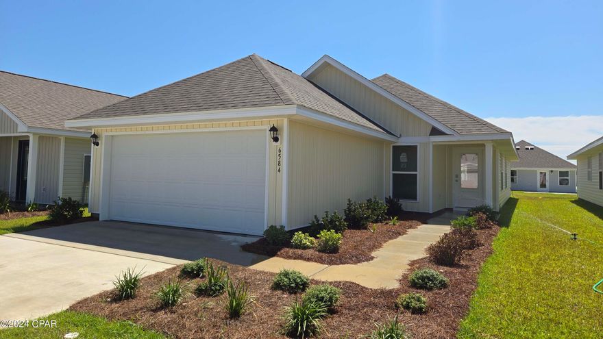 Welcome to Liberty. This home is ready for quick move in. This Celeste floor plan is located at 6584 Kettles Street. Featuring 3-bedrooms, 2 full bathrooms, and 1,427 square feet, this home has an open concept floor plan. Interior features of this home include EVP flooring in living and wet areas, granite countertops, stainless kitchen appliances which include a stove, microwave, and dishwasher. The kitchen features a breakfast bar area with room for seating. The primary bedroom is located at the back of the home and features a large closet with an ensuite bathroom with dual sink vanity and large shower. The laundry room and additional bedrooms are just off the living room. This home is a must see. Like all homes in Liberty, the Celeste includes a Home is Connected smart home technology package which allows you to control your home with your smart device while near or away. Liberty neighborhood is conveniently located in beautiful Panama City off Star Avenue near 231. Located just 25 minutes from Tyndall Airforce Base, 20 minutes to hospitals, and less than 15 minutes to shopping, restaurants, and grocery stores you will be amazed at the convenience once you enter the winding entrance to this beautiful sanctuary. Liberty, D.R. Horton's premier new lifestyle community, offers a 7,500 square foot community center with full gym, wellness rooms and much more. Additionally, behind the community center is a water wonderland with resort style pool, splash pads, and an outdoor grilling kitchen with seating.