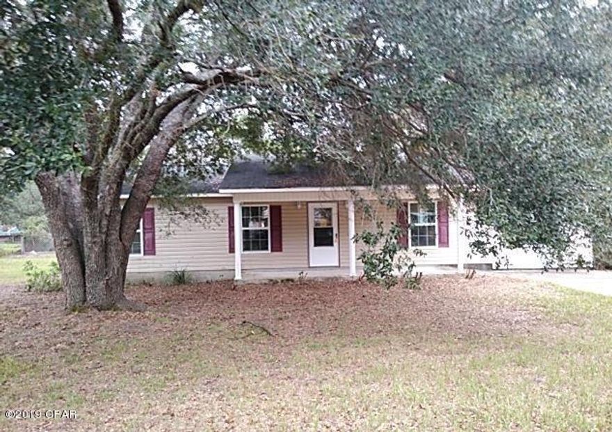 **Right around the corner from The Baptist College of Florida is a great opportunity **

Home built in 2006 on half acre features 3 bedrooms and 2 baths in City of  Graceville.  Huge potential with a little TLC. Sold As-Is. Property will be conveyed with Non warranty deed or Quit claim deed Only. '