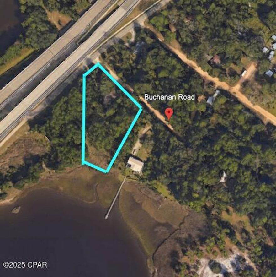 Looking for the perfect commercial development site?  Look no further!  This jewel nestled beside the Buchanan Bridge in Westbay has a LOT to offer.  Listing is total of 2 acres, consisting of 2 lots (.75 acre + 1.25 acre).  1.25 acre lot has FLU of West Bay Center which allows commercial development.  .75 acre lot is residential, but surrounded on all sides by commercial, which significantly improves chances of upzoning with D.O.
Excellent location for restaurant, bar, boat rentals, or variety of uses.  Lot is accessible by paved road and additional public parking is very closeby under the Buchanan Bridge.  This location is just a few hundred yards from Latitude Margaritaville, so you would have a built in customer base on your doorstep!