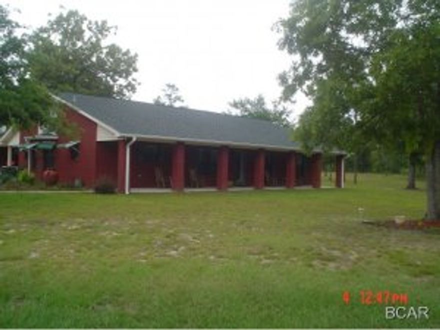 Looking for room to roam, then bring your horses and other livestock. They are welcome. This all brick home sits on 80.5 acres. Bear Creek runs through West side. There is a man made pond which in the past has been stocked with Bream. A well and pump at pond for replenishing water. Family members hunt on property and have bagged deer. A 2,400 sq. foot metal barn on concrete slab with 2 11' overhead doors. Dining,living and kitchen recently painted using faux paint. Entire 80 acres is fenced with 4 strans of barbed wire. Zoning, Ag 1.