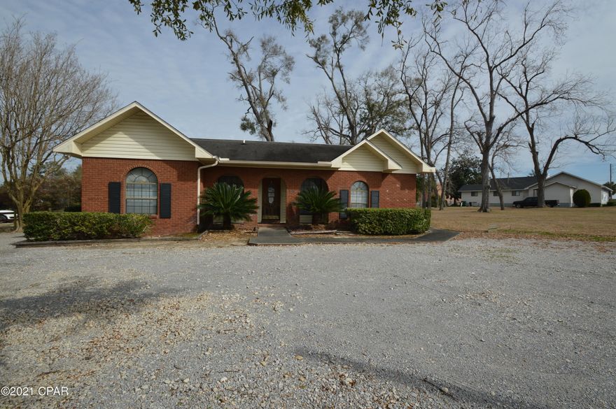 'CURRENTLY UNDER CONTRACT, SELLER ACCEPTING BACKUP OFFERS'. GREAT LOCATION! Commercial brick building sitting on a corner lot on HWY 90 and conviently located across from the courthouse.  Would be perfect for an attorney office etc. Building has 3 office spaces, reception area, 2 conference rooms, 2 half bathrooms, kitchen and copier room.

There is parking in the front and the back of building.