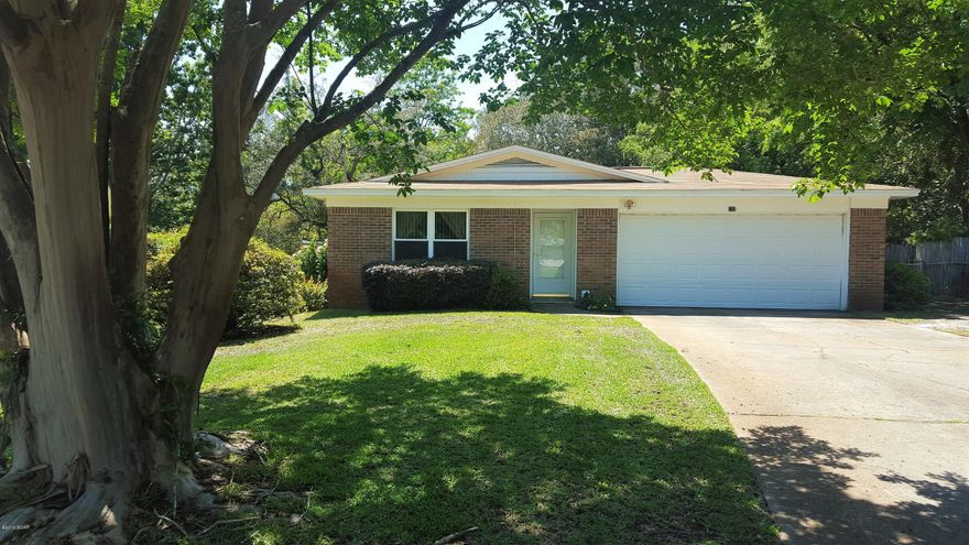 New Carpet and New Paint! All brick home located in Callaway, convenient to Tyndall Air Force Base and Under the Oaks Park. A 3 bedroom, 2 bath with large living room and formal dining room. Kitchen offers a breakfast bar and is open to living area. A fireplace is located in the living room, giving lots of character to the living space. A screened in back porch is located off the living area, leading to a large, fully fenced, yard. Chain link fence has a double gate, great for boat parking or additional parking. There is a large 2 car garage with lots of space for storage or parking. Master bedroom includes his and hers closets and master bathroom. This a great, spacious home with lots to offer and in close proximity to TAFB.