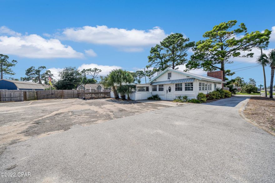 A prime commercial location for sale with 218 feet on Thomas Dr., near the NSA, Bay Point with a 30,000 traffic count. Newly updated freezer and cooler with diamond plate floors.  Bathrooms have been redone, the kitchen has been redone and painted.  New lift station pump and new Rinnai commercial tankless hot water heater.  Too many updates to list.  Bay Co map shows these parcels as .39, my recent survey as well as DOT show it as being between .41 and.429 acres.  This location has previously been restaurants; the building has a drive thru, 19 regular parking spaces, and 1 handicap space.   It has a great patio area for dining or entertaining, a covered outdoor area that has removable windows for when the weather is nice. Seller is a licensed Real Estate agent.