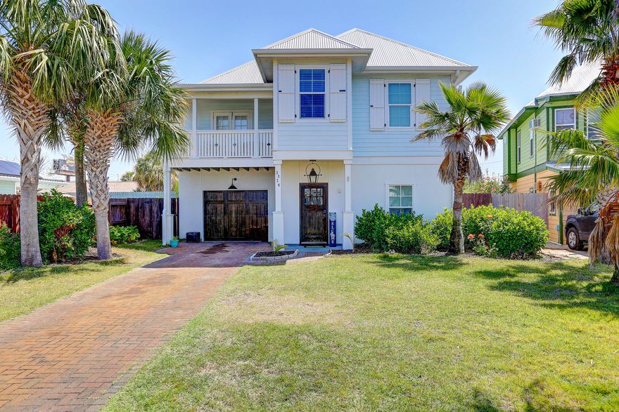 Under Contract, taking back-up offers. INTERIOR PHOTOS COMING SOON. Available to show after 4/30. Gorgeous 3 bedroom home close to the beach! Enjoy the short distance to Schooners and the sandy beach with this beautifully appointed home. Hardwood floors upstairs with stained concrete downstairs makes for low maintainence perfect for those sandy feet. Enjoy warm summer days by your own modern, private pool, and catch the ocean breeze on the balcony. Plenty of architecural details like the beamed ceiling and shaker siding, as well as beautiful bathroom and laundry room floor tile add interest and appeal! This house is a must see for anyone wanting to take advantage of the beach life! All measurements are approximate and should be verified by the buyer if important.