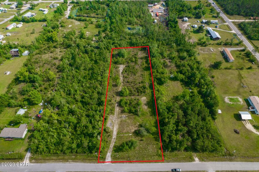 Welcome to 7715 Blueberry Road in beautiful Panama City, Florida! This property offers an expansive two acres of land, providing you with ample space to build or place your dream home! This property has endless possibilities with two wells and two septic's in place. The land allows for the creation of a private estate with room to grow! 7715 Blueberry Road is located right on the outskirts of town granting you easy access to the cities amenities while still enjoying the tranquility of a rural surrounding.  Whether your envisioning a peaceful retreat, investment opportunity or agricultural venture, this property provides the foundation for your dreams to become a reality! Schedule a showing today and 'Say Hello to a Good Buy!'

Additionally this property has two addresses, 7717 Blueberry Rd from prior second home.

This Property is zoned R2 for Single Family, Duplex or Mobile/Manufactured homes!