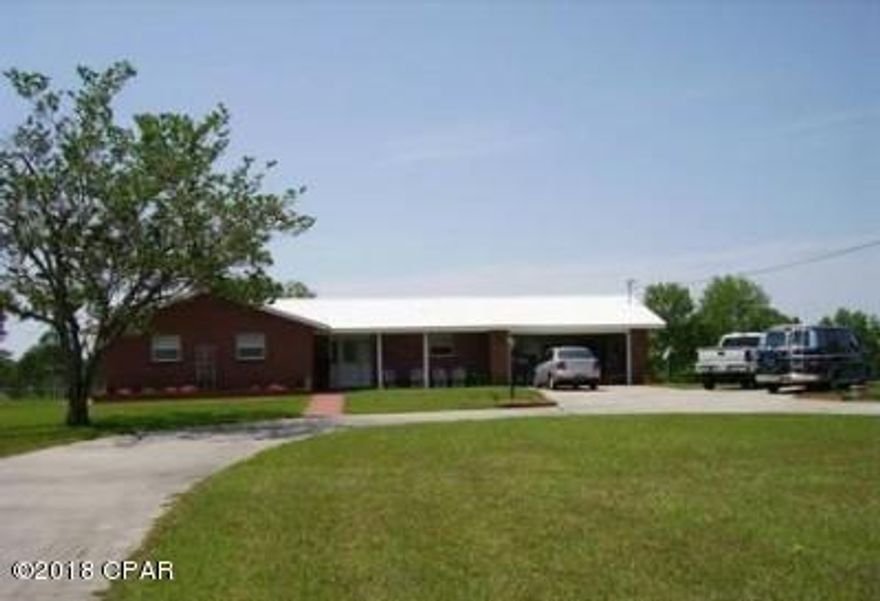 UPDATED 3 BDRM BRICK RANCH ON 3rd hole- 4th fairway of DOGWOOD LAKES GOLF COURSE... 7 miles north of Bonifay, FL off Hwy 177-A.

** On double lots, almost 2 acres>> This all electric Home has been completely updated since 2006>LAST APPRAISAL gave the house a 2005 ''Effective Build'' upgrade.> Nice upgrades> Energy-Efficient appliances, 3-1/2 Ton 15 SEER H/C unit, and H/W Heater. Very reasonable electric bills to cool 1,560 sq.ft. heated/cooled living space> all ceramic tiled floors>crown mouldings> granite counters & marble backsplash kitchen >remodeled bathrooms with grab bars >attached garage has laundry and workbench areas, plus storage shelving and cabinet.> 2nd lot has 1-car sized brick shed for golf cart and riding lawn mower. **** HOME WARRANTY WILL BE PROVIDED BY SELLER.