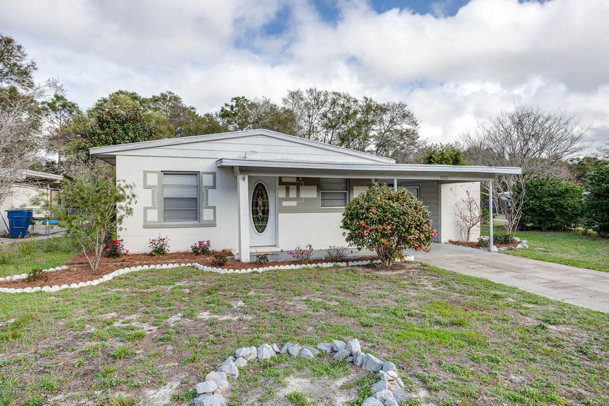 Cute 2 bedroom, 1 bath block cottage in St Andrews!  This home sits on a large corner lot and has tile flooring throughout. There is a living room and formal dining room with gorgeous archway, can also be used as 2 living areas. There is a dining area off the kitchen,  bathroom is currently being remodeled, and the laundry area is located off of the carport. All sizes/ measurements/info approx, please verify if important!