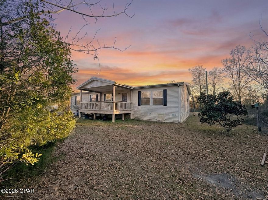 Welcome home to this well-maintained 2008 mobile home offering comfort, space, and incredible potential! Enjoy relaxing mornings and evenings on the covered front and back porches, perfect for soaking in the peaceful surroundings. Inside, the inviting living room features a cozy fireplace and an abundance of windows that flood the space with natural light.
The spacious primary suite is a true retreat with a large en-suite bathroom, complete with a central soaking tub, separate shower, and double vanities. The home offers partially open sight lines with an open dining area flowing into the kitchen—ideal for everyday living and entertaining.
Outside, you'll find multiple storage sheds, including one with a partial kitchen setup, electrical and water already in place (can be reconnected)—great for a workshop or hobby space.. The over 1-acre lot provides room to spread out and includes an original abandoned home that may be repairable for a potential second homesite (no value given).
Whether you're looking for a move-in ready home with extra space or a property with future possibilities, this one checks all the boxes!