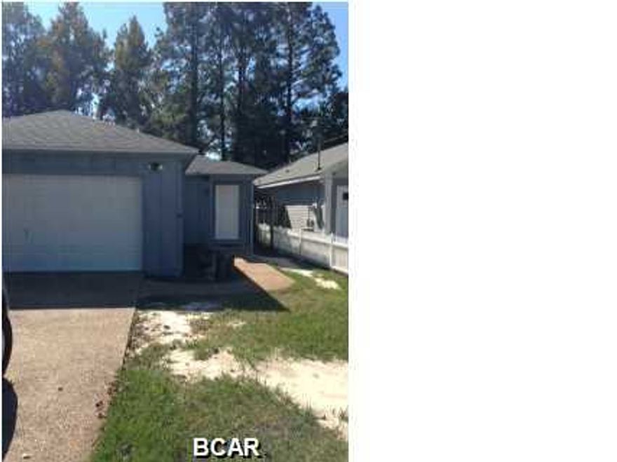 Well maintained home located close to Tyndall Air Force Base, shopping, dining, and entertainment. This home features a living room with a fireplace, dining area, closet laundry room area, and new carpet and paint. The fenced in backyard and the screened in patio is perfect for enjoying the warm Florida weather.