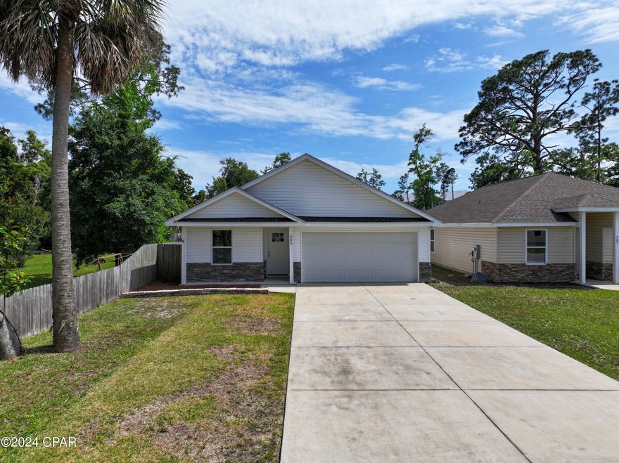 Move in incentive! Up to $500 off of 1st months rent if rented by December 15th! 

Enjoy the convenience of traveling to the beach or Panama City in this cozy three-bedroom, two-bathroom home located on the east end of the beach in Woodlawn, just west of the Hathaway Bridge. This adorable home, built in 2017, is situated in the charming Woodlawn Village, which includes an extra parking area in the center. 

Features:
Year Built: 2017
Bedrooms: 3
Bathrooms: 2
Garage: Attached 2-car garage with workbench
Floor Plan: Open floor plan with a large pantry
Yard: Privacy-fenced backyard
Pets: Pets welcome, preferably dogs
HOA: Covered by the owner
Washer/Dryer: Included (maintenance responsibility of tenant)
Lawncare: to be maintained by Tenant
Pest Control: Owner will cover annual pest control. Tenant to obtain additional if necessary.

Additional Amenities:
Extra parking area in the center of the community. Convenient access to the beach and Panama City. Across the street from the Naval base.

Don't miss out on this lovely home that combines comfort and convenience in a desirable location. Contact us today to schedule a viewing!