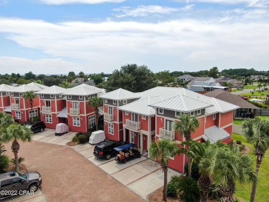 CURRENTLY UNDER CONTRACT, SELLER WILL CONSIDER BACKUP OFFERS! Small community beach townhome that is just a short golf cart ride to the beach & close to some of the beach's best restaurants, local's favorite hangouts & Pier Park! This beautiful corner unit townhome, featuring high ceilings, plenty of storage & a comfortable floor plan is perfect for full- time living or a second getaway beach home!   Recent upgrades include fresh paint, new flooring & carpet, new quartz countertops & backsplash in the kitchen.  All new furniture throughout the unit less than a year old. Main level features master bedroom with a private bath, living area, kitchen & half guest bath. Second level features two more bedrooms with a Jack & Jill bath & laundry. Coral Bay Village features a community pool.