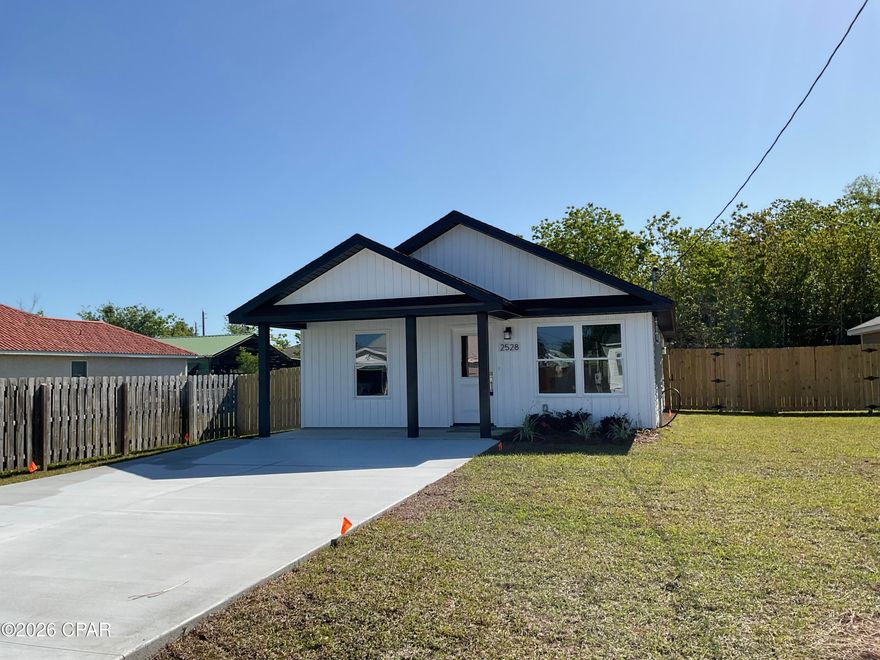 New 3 bdrm 2 bath home with LVP and cathedral ceilings in the living area.  Nice kitchen with granite breakfast bar.  Lovely starter home with two bathrooms and a partially fenced yard.  It is just off Hwy 231 with great access to shopping and places of interest.  Just 1.2 miles to 23rd Street for all your shopping needs. Large living dining area provides space for the family to gather.
