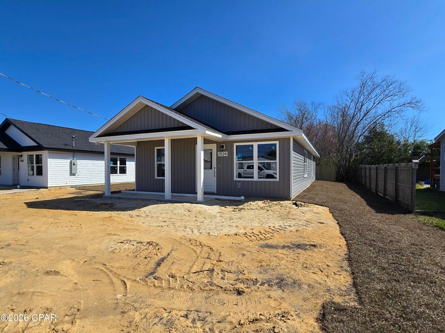 New 3 bdrm 2 bath home with LVP and cathedral ceilings in the living area.  Nice kitchen with granite breakfast bar.  Lovely starter home with two bathrooms and a partially fenced yard.  It is just off Hwy 231 with great access to shopping and places of interest.  Just 1.2 miles to 23rd Street for all your shopping needs. Large living dining area provides space for the family to gather.