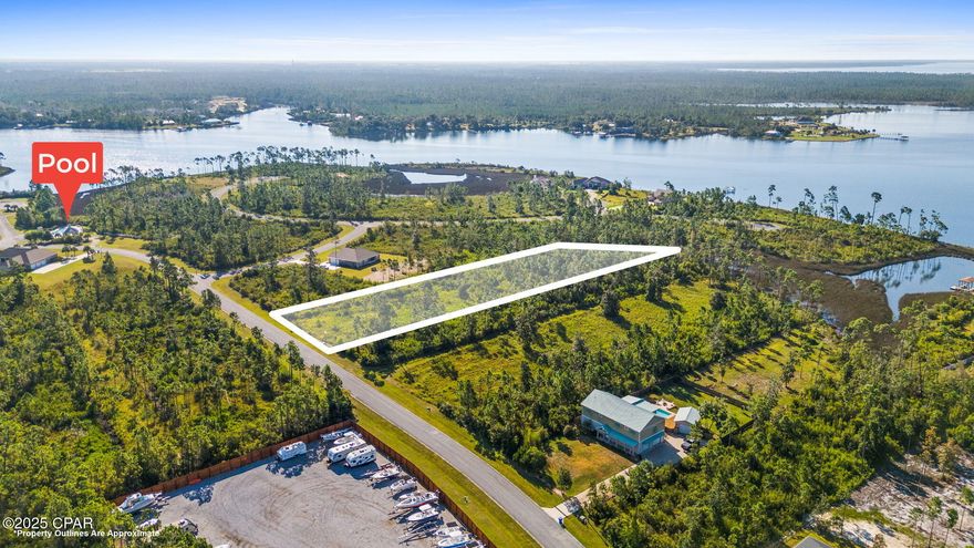 Looking for a large lot to build your DREAM HOME, in one of Bay County's most Prestigious, gated, neighborhoods? Laird Bayou is a gated community with a community pool, community, RV/Boat parking, and best of all its very own private boat launch and extra parking. This large lot is primarily located in the X flood zone, making this one of the more desirable building lots in Laird Bayou. It is also conveniently located within walking distance to the community pool and boat dock as well as the RV/Boat Storage area.. (<3 min walk) Call your Realtor TODAY to see this great lot and tour Bay County's most prestigious hidden community.