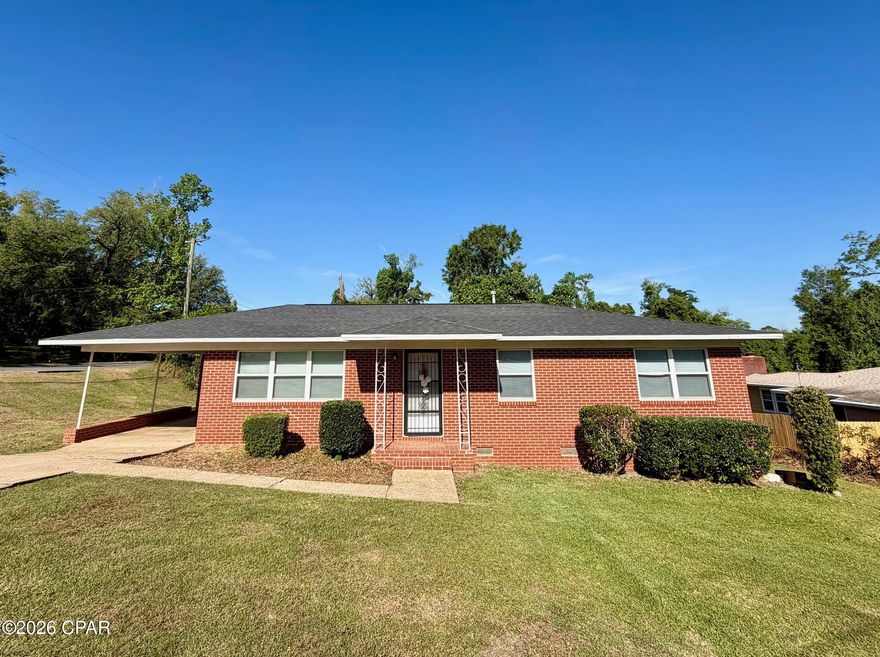 Check out this adorable 3 bedroom, 1.5 bath brick home in Marianna!  The spacious living room features original hardwood floors.  The eat-in kitchen features solid wood cabinets, a breakfast bar and windows overlooking the backyard.  The master bedroom includes a convenient half bath and a walk-in closet.  Step outside to a concrete patio that's perfect for relaxing or entertaining, along with a storage building for your needs.  Situated on a corner lot in a great location, you'll enjoy being close to Jackson Hospital, Chipola College, parks, and shopping.   Major updates include newer windows, new roof in 2019 and a new HVAC system in 2023. Schedule your showing today!
