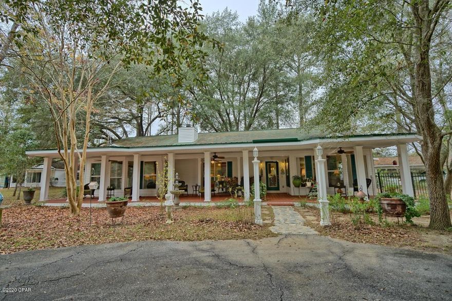 'CURRENTLY UNDER CONTRACT, SELLER ACCEPTING BACKUP OFFERS' 

20 acre estate is a nature lover's sanctuary with cypress ponds,walking trails, wildlife, just 20 minutes to Northwest Florida International Airport and 30 minutes to Panama City & beaches! Property is located in Vernon city limits next to schools, EMS nearby. 

The 2400sqft. 2BR/2.5BA main home boasts 900 sqft master suite complete with a sitting area, fireplace, and walk-in closet, updated kitchen. Steps away is a charming guest house complete with 3/4 bathroom and kitchen. At the entrance to the property there is a 300 sqft. office building that was used as a professional office. Additional 20 acres of residential land for sale that can be purchased with this property for additional $75,000,see MLS #700676