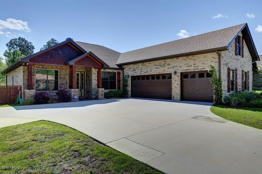 GORGEOUS HOME IN A FABULOUS neighborhood and great school district! Beautiful cedar shutters and pillars on this brick home accented with stone. Circle driveway offers easy access and lots of parking. Huge 3 car garage has plenty of room for a workshop or parking for your ''toys''! Full of extras, this home has hardwood flooring throughout, tile in bathrooms, bedrooms are carpeted, crown molding, deep baseboards, 10' ceilings, granite counters in kit and baths and a pantry in kit. Kit has an island w/breakfast bar, stainless appliances and is open to the great room with an impressive elec, floor to ceiling stone FP. Split bedroom plan has 2 bedrooms and a bath on one side of the home, MBR and 4th bedroom on the other (making it the perfect nursery or office), plus there is a huge bonus or 5th bedroom or media room or playroom above the garage. Stunning custom cabinetry thru-out, lots of storage and a large laundry room, also with custom cabinets. Covered back patio overlooks spacious, fenced backyard and pond, perfect for fishing and just watching the birds and other wildlife from your backyard. Lovingly cared for, the improvements include gutters, picket fence, circle driveway, tinted windows, wooden blinds throughout, separate water meter to keep your grass green without going broke and a transferable termite bond with ENSEC. Don't miss your opportunity to join this wonderful neighborhood! All measurements are estimates. If concerned, please verify.