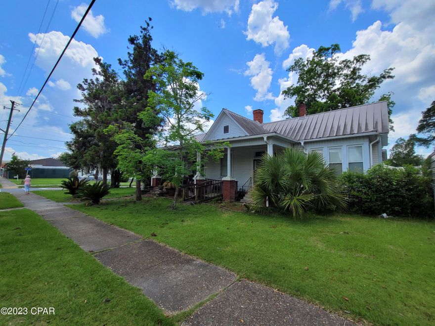 CURRENTLY UNDER CONTRACT, SELLER WILL CONSIDER BACKUP OFFERS. Investors looking for potential rental properties or someone who loves older homes to make your own. This 1901 built home sits on a large corner lot in town on Main St. The main home offers 2,381 sq ft +/-, a front and side entry to the home, kitchen with plenty of storage, formal dining room and living room has coffered ceilings. There are 4 bedrooms, 2.5 baths. 5 fireplaces, 4 are closed. Bonus room. Home does need repairs and is being sold as is. Front and side covered porches. Covered parking. Additional 644 sq ft +/- rental home or mother in law space sits on a small lot, faces Watts Ave and has covered parking. Close to downtown amenities.