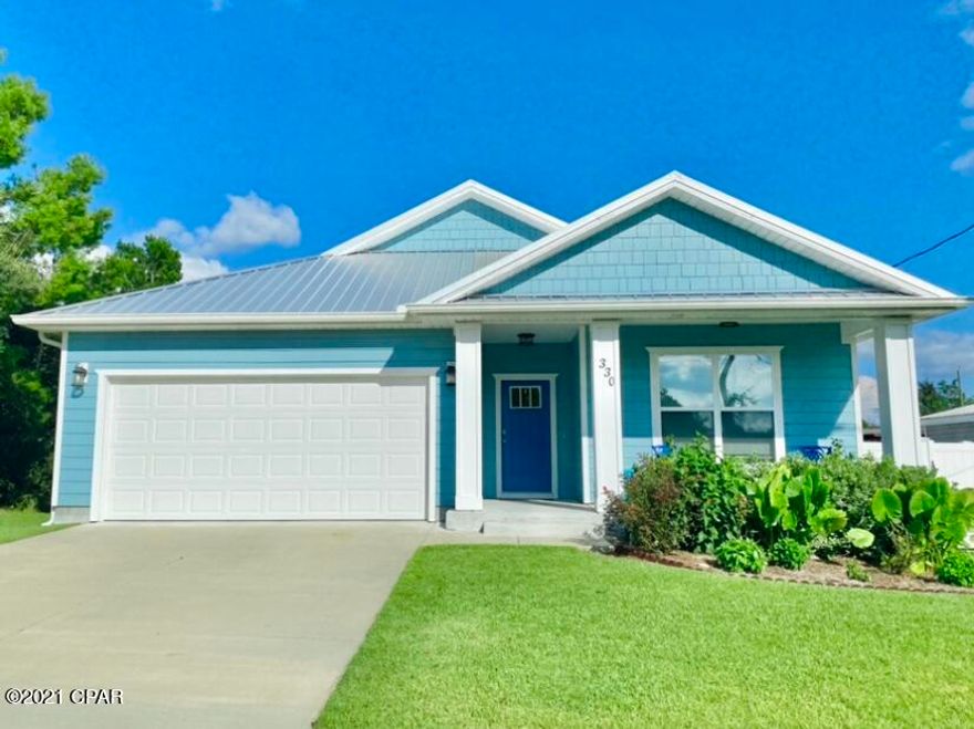 CURRENTLY UNDER CONTRACT.  SELLER ACCEPTING BACK UP OFFERS. WEST END BEACH HOUSE! This is the only house of its kind available for sale! It is located in the coveted west end area of PCB. Only three years old, with all the upgrades! The ultimate open floorpan! This gem includes a metal roof, vinyl fencing to encompass the entire back and side yard, 300 square foot screened patio with wood plank tile to match the interior of this beautiful home, private outdoor shower to rinse those sandy feet after a day at the beach, sprinkler system, top of the line KitchenAid 5 drawer refrigerator along with high end black stainless steel LG appliances, lovely stone countertops throughout, custom showers, large walk in closet in the master, beautiful wood plank look tile, double garage, attic access for extra storage, security system, and the list goes on! The oversized lot can accommodate a swimming pool if you wish to add one. This house is absolutely immaculate!! From the gorgeous interior to the perfect lawn, you will love this property! There is truly nothing like it! It will be a perfect first or second home, or a lucrative investment with potential to exceed $60K per year in rental income. 330 Palm is less than a half mile to the very nearby beach access 84. A two minute golf cart or bike ride, or less than 10 minute walk and you will have your toes in the white sugary sand enjoying the emerald green waters and breathtaking sunsets!  This is truly a must see!! There are some items/furnishings that will not convey, but the house will have furnishings that will be turnkey ready for a short term rental property. *All information is approximate and should be verified by buyer if important.