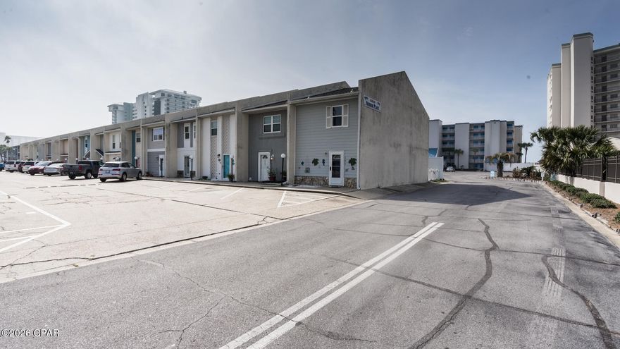 Low HOA fees, Community pool and grassy backyard are some of the great features this beach townhome offers. Unit has LVP flooring, A full bathroom with shower on the first floor and upstairs you have two bedrooms that share a jack & Jill bathroom. The South bedroom has a nice balcony to sip that morning coffee. The complex has a community pool for those few days the beach won't do. Just a short walk to the beach with no major roads to cross. Call your favorite Realtor today to view this townhome. Financing is easy for this unit for a short term rental or a primary residence.