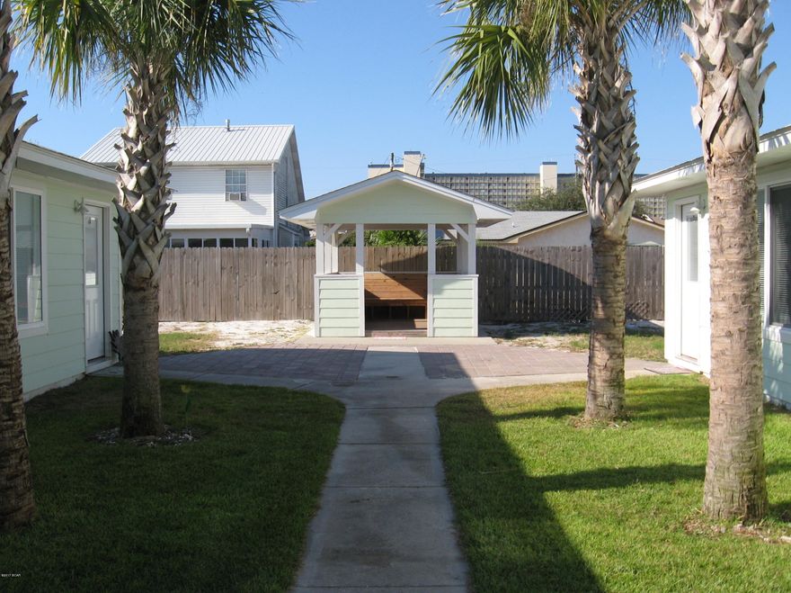 Excellent investment property only four blocks to the beach and two blocks to the Grand Lagoon and public boat ramp! Very popular and well maintained duplex rental with $900 monthly rental income per unit.  Zoned R-3 duplex/triplex/quadplex. Transferable double lifetime Home Depot warranty on recent new roof. All units have been recently painted and have pavers front and back. Three purchase options (1. Buy this duplex and 5803 Pinetree Avenue together (see MLS #654385). (2. Buy one duplex building (this listing) or 654382  (3. Owner will consider selling individual units for $125k. Seller will also consider owner financing on options (1) with $100k down or (2) with $50k down; 6%, with 30 yr amortization with 5 year balloon  (continued) Each unit metered for separate cable tv, water, electric and security lighting. New hardie board siding in 2009.  Double lifetime 88 year roof warranty is transferable to new owner by Home Depot and was installed a few months ago. First year includes inside damage from any leak. Each unit has 1,046 square feet heated and cooled plus private storage/laundry area. Master bedrooms feature two closets. All inside walls are insulated, walls between units are concrete.   Please note photos are mixed from both duplex buildings located at 5801 and 5803 Pinetree Avenue. Variations between the units is very minor and all have identical floor plans.