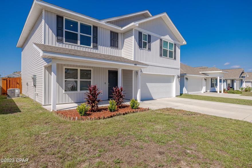 A must see great family home. Convenient to 23rd st and Tyndall Air force base. 5 bedrooms with 3 bathrooms that was built in 2021. Freshly painted and carpet cleaned, shows like a new home. Double vanities, large tub, separate Shower and large walk in closet in master bedroom. A bedroom and full bathroom downstairs with master and 3 others upstairs. Open floor plan with large center island in kitchen with good size pantry.Comes with refrigerator and washer and dryer.  Privacy fenced back yard with covered patio .