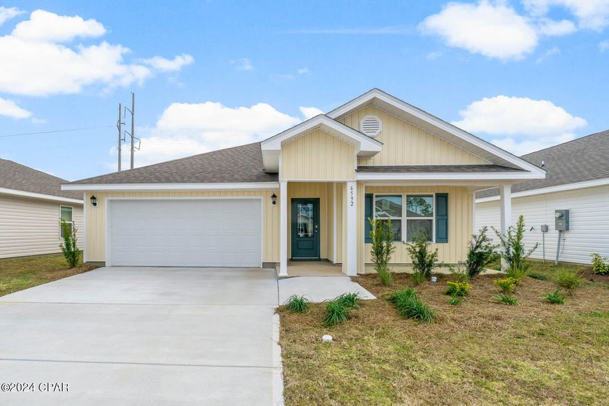 As you enter this Cali floorplan you will find traditional 8' ceilings. Luxury Vinyl Plank flooring in all common areas of the home and carpet in bedrooms. Open concept floor plan for entertaining. The kitchen has a center island, a large pantry, White Cabinets with durable laminate countertops. The kitchen is equipped with Brand name SS Range, Dishwasher and Microwave. A standard Smart Home package includes a KwikSet keyless entry, Skybell doorbell, automated front porch lighting, an Echo Dot device, and Quolsys touch panel which can be integrated to control your lighting, thermostat, front door and so much more. A builder 10 year structural warranty is also included. Liberty neighborhood is conveniently located in beautiful Panama City off of Star Avenue near 231. Located just 25 minutes from Tyndall Airforce Base, 20 minutes to hospitals, and less than 15 minutes to shopping, restaurants, and grocery stores you will be amazed at the convenience once you enter the winding entrance to this beautiful sanctuary. Liberty, D.R. Horton's premier new lifestyle community, offers a 7,500 square foot community center with full gym, wellness rooms and much more. Additionally, behind the community center is a water wonderland with resort style pool, splash pads, and an outdoor grilling kitchen with seating.