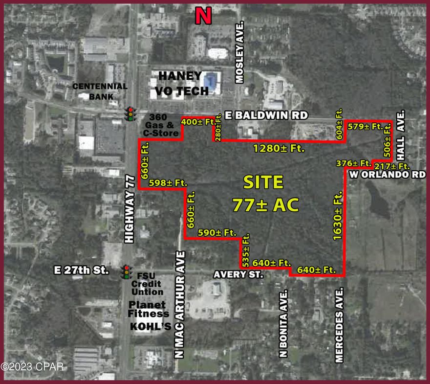 The very best commercial site in Panama City is now available for purchase. This 77± acre tract is located at and around the southeast corner of Highway 77 and Baldwin Rd between the new 360 Gas + C-store and Tonya's Garden, and adjacent to 360 on Baldwin Road. The opportunities are endless for a property with this size and location. Being near the middle of ALL commercial activity in Panama City and Lynn Haven makes this site worthy of your serious consideration. Two median cuts on Highway 77. Excellent location for a commercial development and multifamily on the rear.