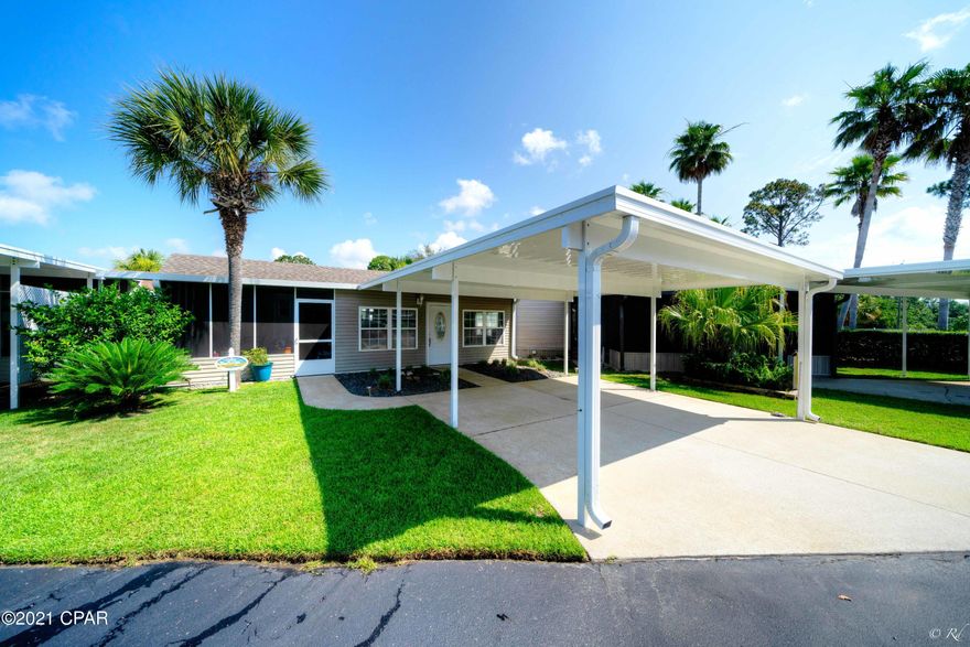 Are you looking for a charming home located in one of the highly sought-after communities in Panama City Beach? Look no further! This property has it all. Walk across the street to the clubhouse and pool while enjoying this beautifully maintained home at Emerald Pointe Resort. The home features 2 bedrooms, 2 bathrooms, addition with living room and screened in Florida Room, updated kitchen with quartz counter tops and tile back splash, stainless steel appliances, a full-size dishwasher, coffee bar with added cabinets for storage, and 2 outside storage buildings, one with a full size washer and dryer. Recent updates include: Roof 12/2018 and Carport 1/2021.

Emerald Pointe Resort is a gated community located in the heart of Panama City Beach close to restaurants, shopping, and the world's.. most beautiful beaches. Amenities include a large clubhouse, exercise room, 2 pools (one heated seasonally), hot tub, lake with boardwalk, and shuffleboard court. HOA fee includes water, sewer, garbage, cable, and lawn service. All information is approximate and should be verified by buyer if important.