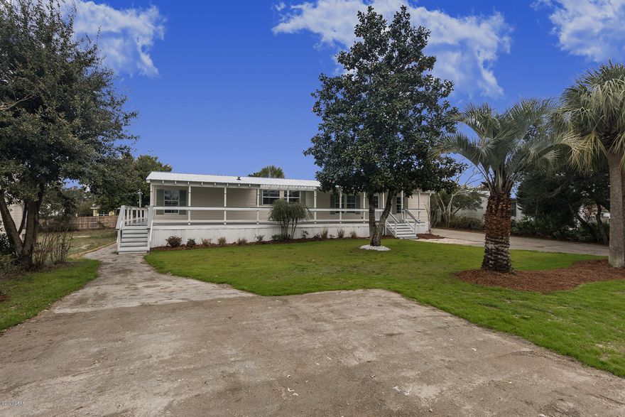 CURRENTLY UNDER CONTRACT SELLER TAKING BACK UP OFFERS This is a wonderful 4 bed 2 bath Manufactured Home on a Huge 85x150 Lot complete with an inground Pool .Guest House  which has 2 bedrooms, full Bath, Kitchenette, Dining Room,  

There is a separate Drive with Sidewalk to the Guest House. Think about using the Guest House

as an Airbnb ! The Huge wrap around deck when you drive up Makes you want to Just sit on the Deck and Relax .Maybe drink Sweet Tea.  HVAC @ 3 years old. After the Hurricane all HVAC Duct work, Plumbing and Sanitary Sewer Lines under the Home were replaced. New Gutters were also just  added. Come and take a look at the Beautiful Landscaping ( Oh My ) .This Home has had Extension Work done to it .  And it Shows ASK YOUR REALTOR FOR THE VIDEO LINK