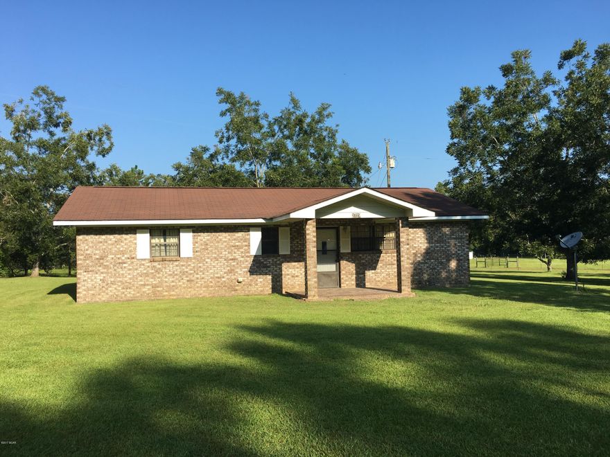 REDUCED   Cozy little Brick home located in the country. 1 Acre loaded with Pecan Trees, Scuppernong vines and other fruit trees, a metal enclosed barn with concrete flooring and lean to allowing cover to park your boat and other items under.The home has central heat and cool, kitchen appliances and more.