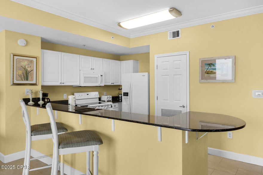 This is the unit for you.  Easy Access with no need for elevator waiting.  Darling 1 bedroom direct Gulf front unit with bunks and 2 baths.  You can not pass up this opportunity to have a Great rental property.  Wicker chair does not remain.  All future rentals with deposit to be accepted by new buyer.