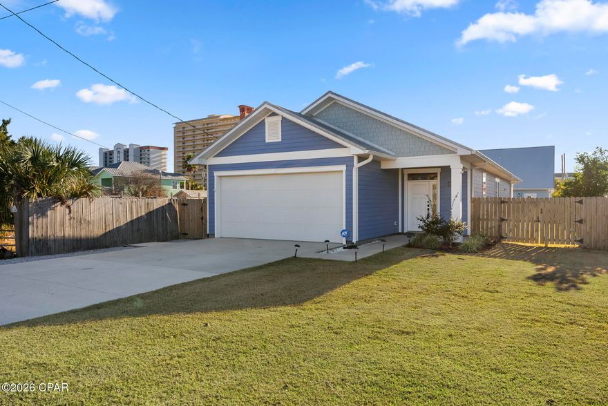 Charming Coastal Retreat - Perfect as a Primary Home or Vacation Rental! Located just 1/2 mile from beach accesses 13, 14, and 15, as well as the Safari boat launch, it's ideal for beachgoers, boaters, and outdoor enthusiasts. The home features 3 bedrooms, 2 bathrooms, and a spacious, privacy-fenced backyard with plenty of room to park your boat or jet skis. Inside, you'll find 9-foot ceilings, elegant ceramic wood-look plank tile, and stainless steel Frigidaire Gallery appliances. The kitchen is equipped with soft-close cabinets and drawers, while the rest of the home provides ample storage, including a walk-in closet in the primary bedroom. The primary bathroom features a large walk-in shower and a linen closet, adding both comfort and practicality. A versatile bonus room off the kitchen leads to the backyard, making it perfect for an office, playroom, or hobby space. The home's thoughtful details include a built-in coat rack and bench at the front door, offering a welcoming touch. Outside, the backyard is an entertainer's dream, complete with a gazebo, covered patio, and plenty of privacy. Within walking distance to the beach and close to outdoor amenities, this home offers endless possibilities, whether you're looking for a tranquil primary residence or a fabulous vacation rental. **Buyer to verify all measurements**