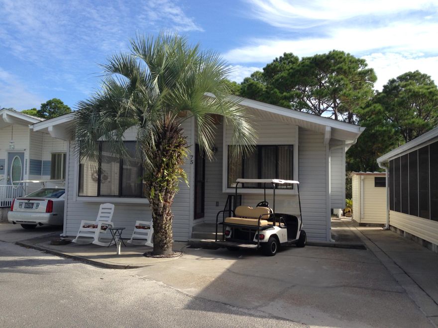 WALK OUT YOUR BACK DOOR TO BEAUTIFUL VIEWS OF ST. ANDREWS STATE PARK!YOUR ARE SURE TO SEE THE DEER! THIS GREAT 3 BEDROOM, 2 BATH HOME IS READY TO MOVE INTO! JUST BRING YOUR TOOTHBRUSH! VENTURE OUT OFFERS A GATED 24 HOUR SECURITY, 2 POOLS, TENNIS COURTS, BASKETBALL COURTS, PLAYGROUND, PICNIC AREAS, SHUFFLEBOARD, MINI GOLF AND IT IS A GOLF CART COMMUNITY! ALL MEASUREMENTS APPROX.