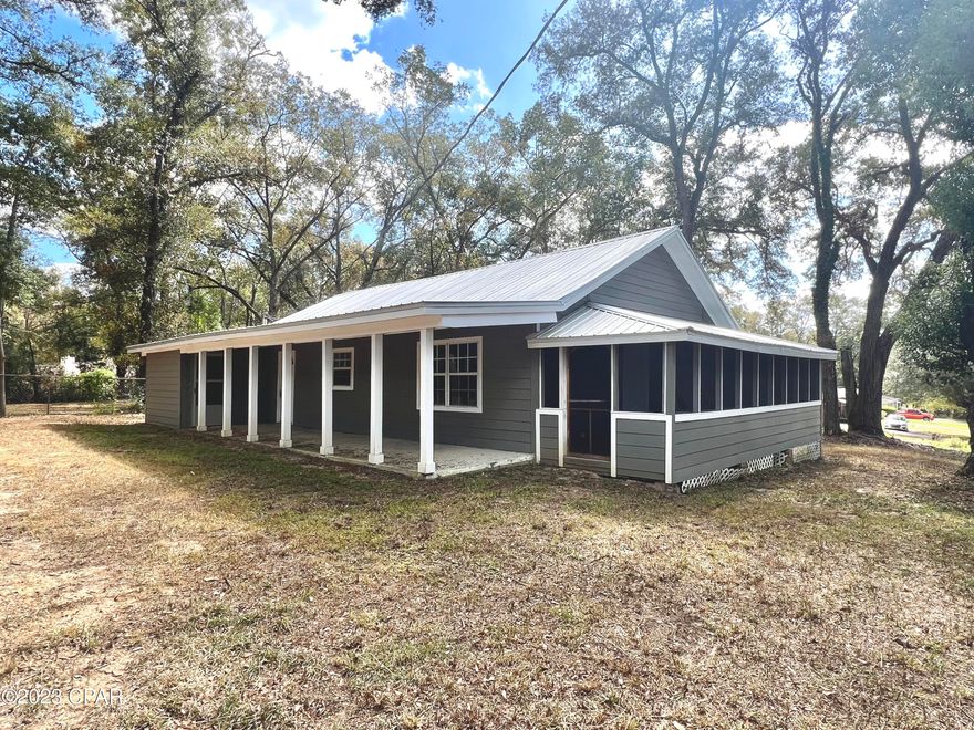 FLORIDA COTTAGE IN THE HEART OF BONIFAY ON A 210x184 LOT!  This 3-bedroom, 2-bath home offers over 1,600 square feet of living space with LVP flooring (carpet in the bedrooms), a central eat-in kitchen, and ample natural light throughout.  The master bedroom accommodates most king-size furniture, includes an adjoining bath, and features a private exterior door leading to a small back deck.  Exterior highlights include a large screened-in porch off the living room, an additional XL covered porch (perfect for outdoor living), and a utility room for additional storage.  Situated on .89 acres, the property includes a chain-link fenced section behind the home (ideal for pets) along with additional space for expansion. Call today to schedule your private showing.