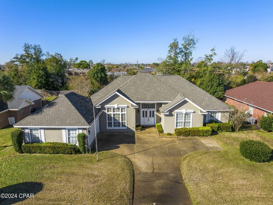 Presenting a move-in-ready gem! This exquisite 4-bedroom, 2.5-bathroom residence, ideally situated in the heart of Panama City, is eager to welcome its new owner. Spanning over 2,600 square feet, the home boasts four generously sized bedrooms, an open floor plan, and a formal dining room. The expansive kitchen and adjoining family room create an inviting space for both dining and entertaining. The formal living room, featuring a cozy fireplace, is conveniently located just steps away from the kitchen. Nestled on a .33-acre lot, this charming home includes a spacious fenced-in backyard. Plus solar panels that will be paid off at closing by the seller.  This home is located in a welcoming neighborhood with no HOA & offers proximity to shopping, dining, and all that Panama City has to offer. Seize the opportunity - schedule an appointment today to explore this beautiful home firsthand.