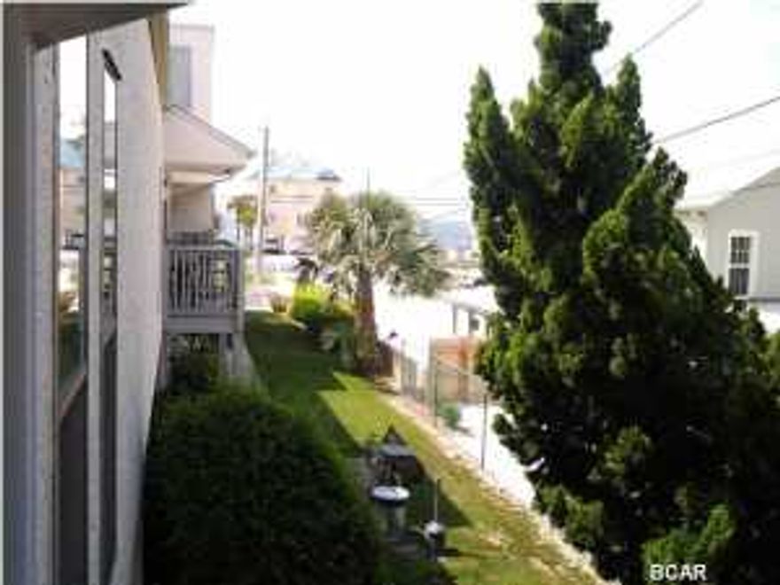 Open House NOV 9TH 1 TO 3 PM, if it lasts that long!!!!!! RECENT REDUCTION SHOWS THESE SELLERS ARE SERIOUS ABOUT SELLING! This condo is in GREAT shape, All furnishings convey (please see photos). Owners have not rented out this unit and they have taken really good care of it so please put this on your must see list! Peek a boo view of the gulf from the private balcony located on side of complex, this balcony is located by a nice shade tree and is secluded from the street but still has a great gulf breeze. Huge bedroom with two full beds and an open floor plan in the living dining and kitchen area make the home feel so much bigger. The bathroom is accessible from the master and the hallway.