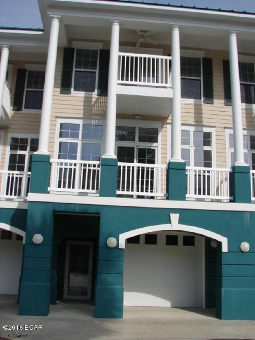 This is a 3 story town home that has 5 bedrooms (or 2 bonus rooms); 2 of the bedrooms have closets in the hallway. Stainless steel appliances, granite counter tops, ceramic tile floors, One of the bedrooms is located on the first floor and is a complete self-contained lockout unit perfect for guests. Master Bedroom has a balcony that has a view of the Gulf of Mexico and there is an elevator in the home. There is also a community pool on site.