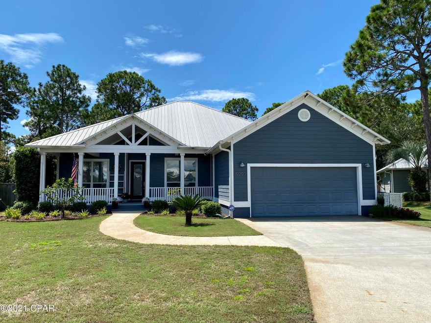 BACK ON THE MARKET in LYNDELL PLANTATION! Located south of Hwy. 98, & an easy stroll or bike ride to the beach! Charming curb appeal & an inviting front porch! Stepping inside, you'll love the 10 ft. ceilings, 8 ft. doors, hardwood floors, crown & a gorgeous fireplace! Large bonus sunroom, plus a home office. Visualize yourself entertaining in your pretty kitchen with stunning tops, exquisite backsplash & newer stainless appliances. Remodeled master bath is amazing, newly updated guest bath as well! Outdoor living, custom designed pool, Bahama Coral & decorative concrete square decking & lush landscaping complete the backyard! Plus 35 acres of conservation area behind you! If you are looking for the PERFECT BEACH HOME WITH A POOL in a great neighborhood, you just found it!