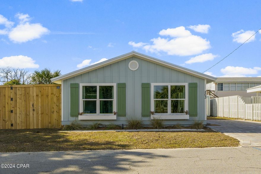 Perfectly situated just 0.10 miles from Beach Access 92 in the highly desired Kiska Beach on the far west end of PCB, Shasta Street Retreat is a meticulously renovated beach haven that is a must see! No expense spared in this remodel project! Offering 4 BR with an additional bunk room(full over full built-in) with 2 BA, 203 Shasta St maximizes every square ft and boasts a top-to-bottom transformation. Literally new everything---new roof, siding, windows, painting, and fencing on the exterior. Interior improvements include entire kitchen and bath renovations, new HVAC, tankless hot water heater, appliances, sheetrock and painting, LVP flooring, and much more! Road boring completed to connect to city sewer. Side yard offers private and quaint outdoor space. Sold Fully Furnished!