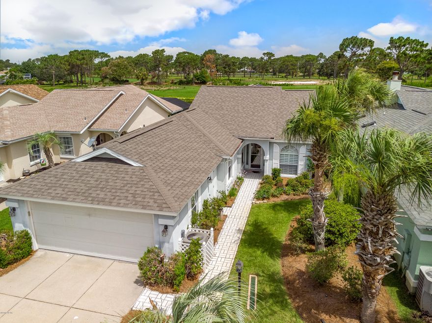 This lovely patio home has everything!  Pond View, Fenced Back Yard, Pool with Brand New Screen Enclosure, Covered Porch, Sprinkler System, New Roof, New A/C, Beautifully Landscaped.  And that is just the outside! 

The inside has beautiful wood look tile, custom blinds, granite counters, stainless steel appliances that include built in microwave, wine refrigerator, double wall oven, dishwasher, 2 drawer French refrigerator, drop in electric cook top with vented hood.  Plus, front load washer and dryer on pedestals. The kitchen has Ivory cabinets with Oil Rub Bronze fixtures and cabinet handles.  And be sure to check out the cabinet built-ins. The backsplash has subway tiles that include artfully installed glass listello that climbs up the wall below the vented hood. There is a glass cabin to show off your stemware or plate collection. The homeowner has also included a nice organized binder for the owners manuals for items in the home.  Both baths have Shower Seats and Spas.  Master bath has a large free standing tub.  Closets have designer built-ins and all fans have remote controls. There is also a remote control blind in the dining area.  The laundry area includes a big laundry tub and the cabinet in the maser bath conveys with the home.  If your home is your castle then you might as well live in a luxurious, close to everything, castle at the beach.