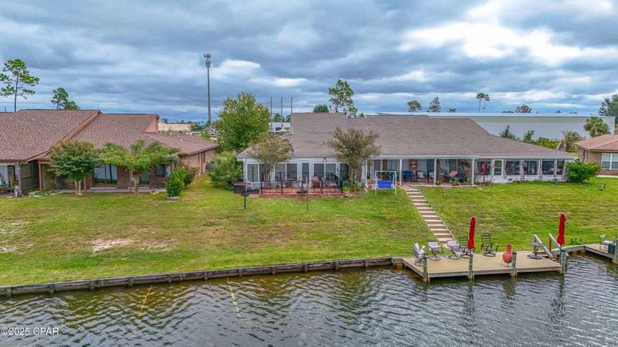 LAKE MARIN WATERFRONT TOWNHOUSE!!! These do not come up very often. Don't miss your chance! The interior of this home features 2 spacious bedrooms, 2 bathrooms, a bonus room/loft, crown molding, a vaulted ceiling, an updated kitchen with granite, an interior laundry area, a large sunroom, an open floor plan, and an attached garage. The kitchen has a breakfast bar, ample counter and cabinet space, tile floors and a window overlooking the courtyard. The loft is accessed by spiral stairs and could be used as a bonus living room, 3rd bedroom (has 2 closets) or an office. The two bedrooms are large and each have adjoining bathrooms. The sunroom extends across the back of the house and overlooks the beautiful Lake Marin. The 2 car garage has built-in cabinets and pull-down stairs. The exterior features a gated courtyard and a sprinkler system. The sunroom was a favorite sitting place to entertain overlooking the beautiful Lake Marin! This unit had an immaculate owner! All ages, sizes and measurements approximate; buyer to verify if important.