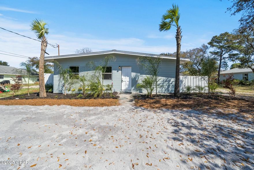 No HOA - Short-Term Rental Allowed - Fully Remodeled!

This fully renovated 4-bed, 2-bath home on Panama City Beach's West End is just minutes from Lake Powell and the beach. Featuring an open floor plan, brand-new windows and glass sliding side entrance door, fully renovated bathrooms, and fresh paint inside and out. With three entrances, a landscaped yard, and a shed in the backyard, this home is perfect for full-time living, second vacation beach home or as a short-term rental. Don't miss out—schedule a showing today!