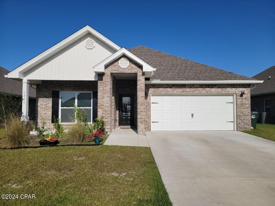 Welcome to Lynn Haven and the newly developed Andrews Plantation community near Mowat Highlands!  This beautiful brick home features Solar Panels for Lower Utility Bills!! It is a 4 bedroom, 2 bath, with a 2 car garage and built in 2022.  The home has an open concept with split bedroom floor plan with 9-foot ceilings. The kitchen features a large breakfast island with granite countertops, pantry, and plenty cabinet space. Spacious master suite with tray ceiling. The master bathroom features double vanity with granite countertops, separate shower & garden tub, and large walk in closet. Covered patio with a privacy fenced backyard. This home is convenient to Tyndall AFB, shopping, schools, restaurants and Panama City Beach. Call for a tour!