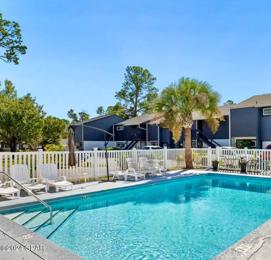 Looking for a quiet place to call home?  This spacious Shadetree Condo is IT.  Boutique community in great location. Only minutes to Navy Base & Beach.  Completely FURNISHED to include linens & kitchen setup. Easy move!  New A/C in June, 2022.  New kitchen appliances & washer/dryer.  2 king-size bedrooms with split floor plan provides much privacy.  Decor says - YOU ARE AT THE BEACH _ RELAX. Community swimming pool and 2 assigned parking spaces.  Call today for an appointment to see.